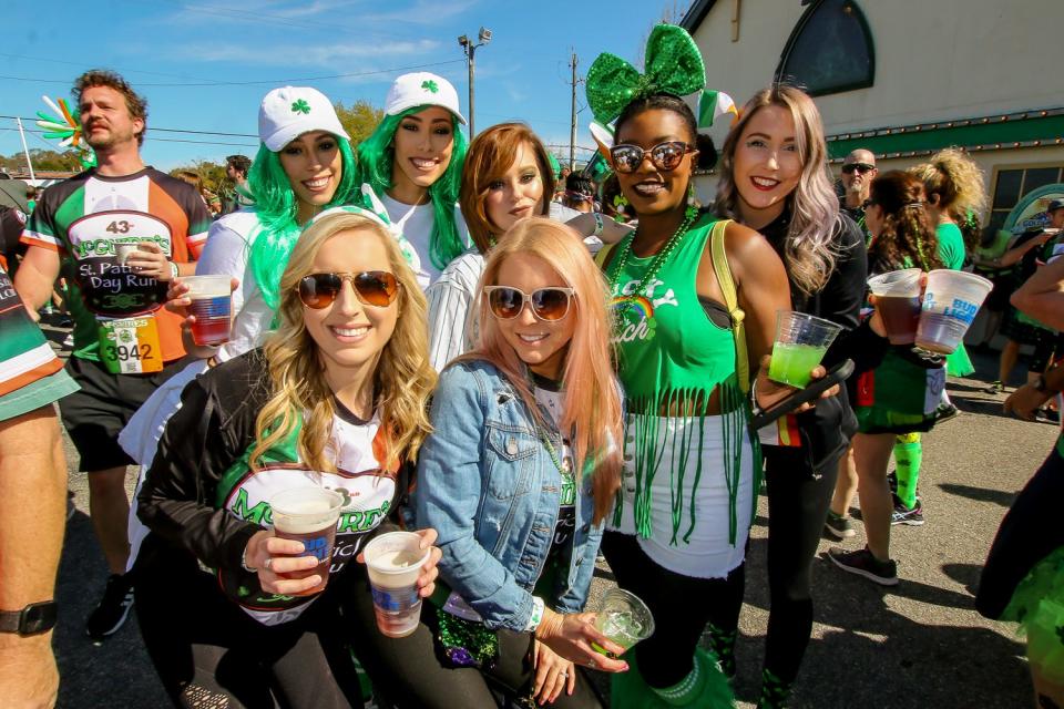 Thousands of people enjoy a gorgeous day while they partake in a previous McGuire's St. Patrick's Day Prediction Run 5K.