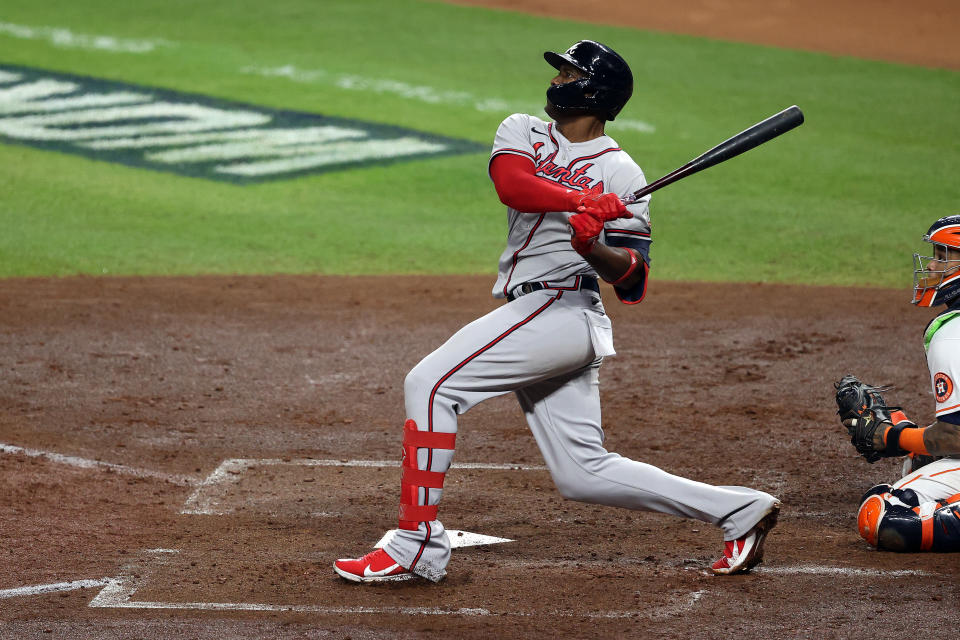 HOUSTON, TEXAS - NOVEMBER 02:  Jorge Soler #12 of the Atlanta Braves hits a three run home run against the Houston Astros during the third inning in Game Six of the World Series at Minute Maid Park on November 02, 2021 in Houston, Texas. (Photo by Bob Levey/Getty Images)