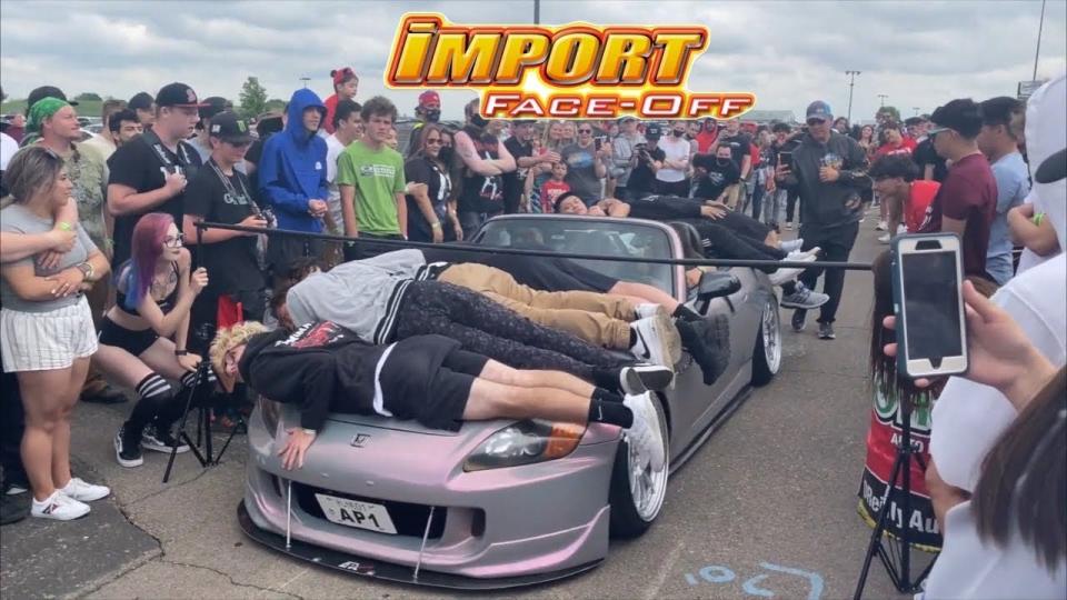 A number of people lay across a Honda convertible while playing limbo with a car. IFO Street Legends will have such an event Saturday.