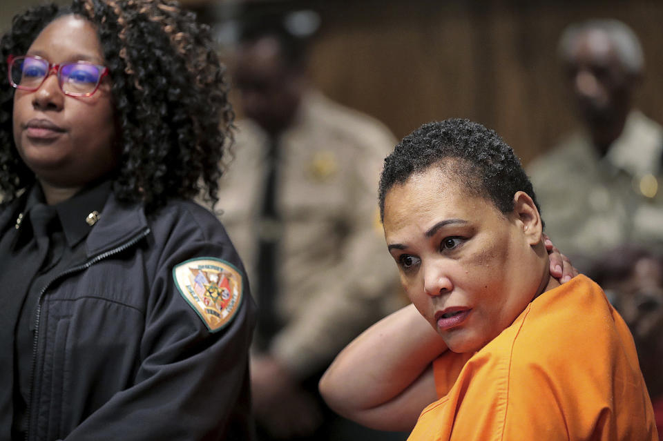 FILE - In this Thursday, July 25, 2019, file photo, Sherra Wright listens as prosecutor Paul Hagerman reads a list of evidence against her during a hearing in Judge Lee Coffee's court in Memphis, Tenn. Billy Turner, a convicted felon charged with conspiring with Lorenzen Wright's ex-wife, Sherra Wright, to kill the retired NBA player, is scheduled to face a judge Wednesday, Dec. 4, 2019, in Memphis, at which time a trial date could be set. (Jim Weber/Daily Memphian via AP, File)