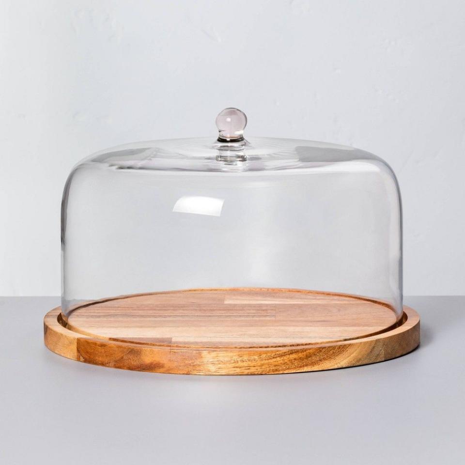 <p><a href="https://go.redirectingat.com?id=74968X1596630&url=https%3A%2F%2Fwww.target.com%2Fp%2F9-34-wood-38-glass-covered-dessert-storage-brown-hearth-38-hand-8482-with-magnolia%2F-%2FA-80178664&sref=https%3A%2F%2Fwww.housebeautiful.com%2Fshopping%2Fbest-stores%2Fa60570206%2Fjoanna-gaines-stanley-lunch-box-target%2F" rel="nofollow noopener" target="_blank" data-ylk="slk:Shop Now;elm:context_link;itc:0;sec:content-canvas" class="link ">Shop Now</a></p><p>9" Wood & Glass Covered Dessert Dish </p><p>target.com</p><p>$19.99</p>