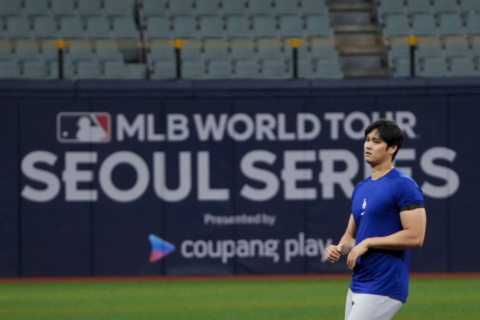 Los Angeles Dodgers' Shohei Ohtani attends a baseball workout at the Gocheok Sky Dome in Seoul, South Korea, Saturday, March 16, 2024. (AP Photo/Ahn Young-joon)