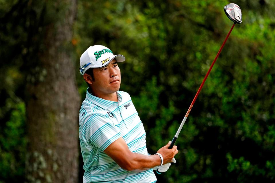 Hideki Matsuyama plays his shot from the 15th tee during the third round of the Masters.