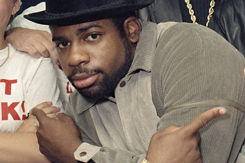 FILE -Run-D.M.C.'s Jason Mizell, Jam-Master Jay, poses with teenagers gathered at New York's Madison Square Garden, Oct. 7, 1986, in New York City. The man accused of killing Jam Master Jay can’t have his rap lyrics used against him at trial, a Brooklyn judge ordered Tuesday, Jan. 30, 2024, in a 14-page ruling dense with hip-hop history. (AP Photo/G. Paul Burnett, File)