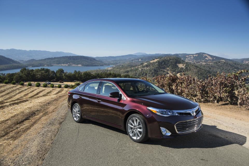 This undated publicity photo released by Toyota shows a 2013 Toyota Avalon. Toyota improved the glass on the latest Avalon in order to deflect more UV rays and cut down on wind noise. (AP Photo/Toyota)