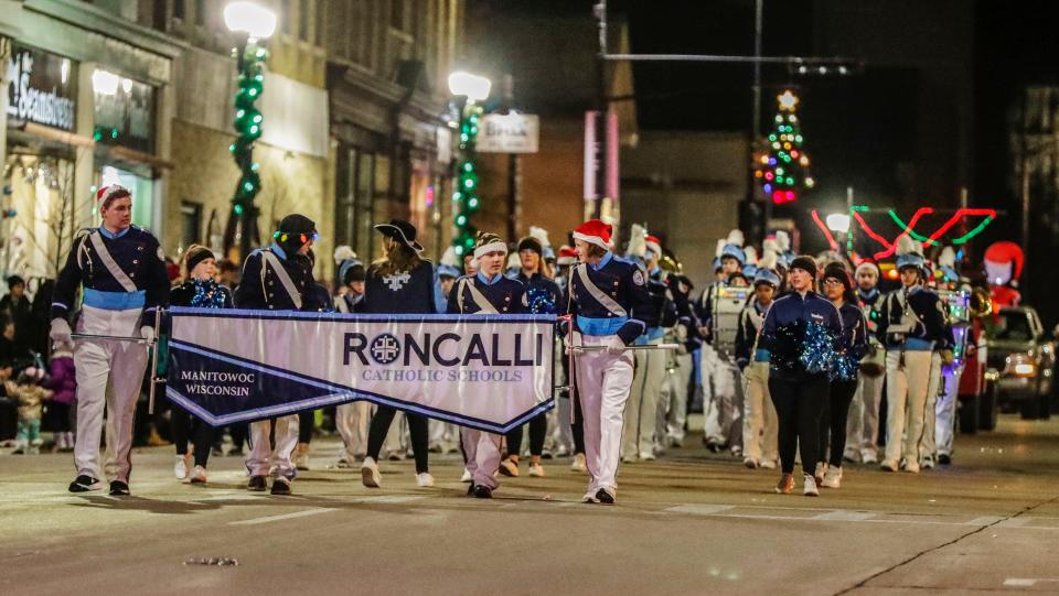 The Roncalli Catholic School band marches during the 33rd Annual Lakeshore Holiday Parade, Wednesday, November 24, 2021, in Manitowoc, Wis.