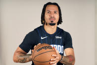 FILE - Orlando Magic guard Cole Anthony poses for a photo during the NBA basketball team's media day, Oct. 2, 2023, in Orlando, Fla. Anthony and the Orlando Magic agreed to a three-year, $39 million extension ahead of the NBA's deadline on Monday, Oct. 23, a person familiar with the deal told The Associated Press. The person spoke on condition of anonymity because the extension hadn't been announced publicly. (AP Photo/John Raoux, File)