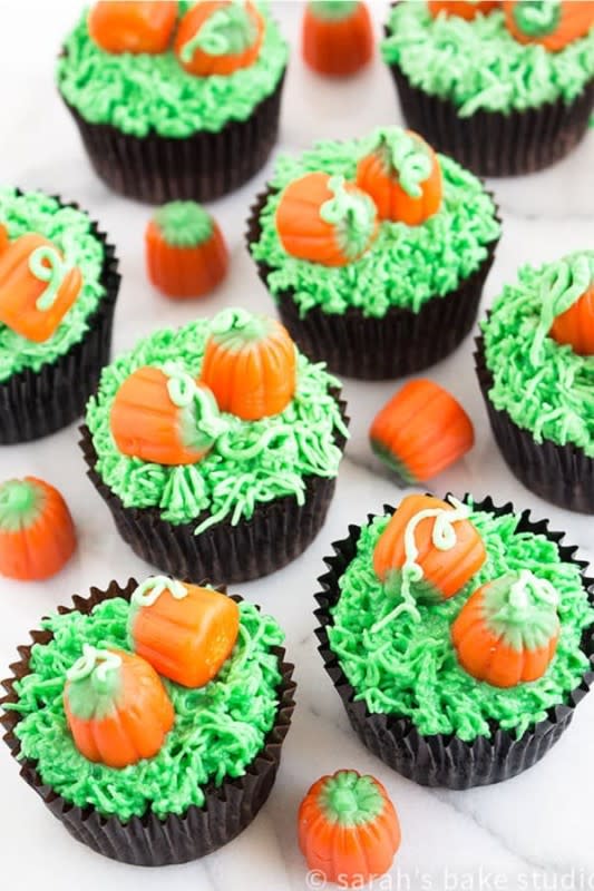 <p>Sarah's Bake Studio</p><p> Make the grass, pumpkins and adorable pumpkin stems for these pumpkin patch cupcakes.</p><p><strong>Get the recipe:</strong> <a href="https://sarahsbakestudio.com/pumpkin-patch-cupcakes/" rel="nofollow noopener" target="_blank" data-ylk="slk:Pumpkin Patch Cupcakes;elm:context_link;itc:0;sec:content-canvas" class="link rapid-noclick-resp"><strong>Pumpkin Patch Cupcakes</strong></a></p>