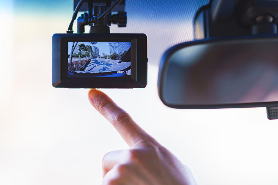 Driver pointing to dashcam. Source: Getty Images