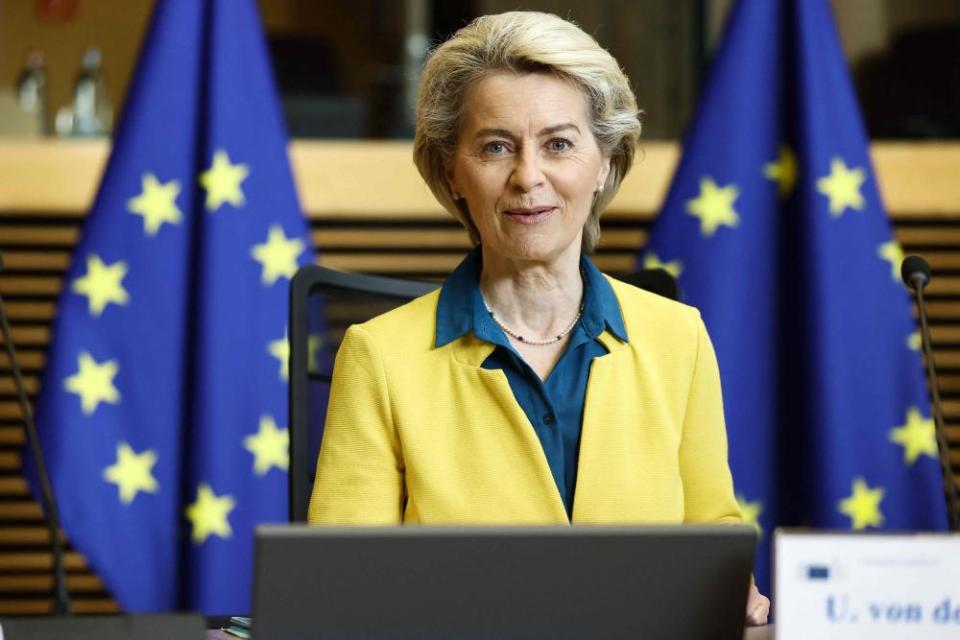 Von der Leyen wearing a yellow jacket and blue blouse, signalling her support for Ukraine