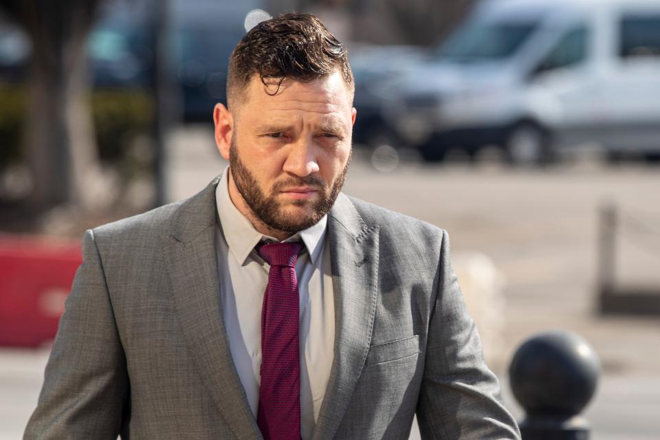 Former Louisville Metro Police officer, Cory Evans, walks into the Gene Snyder U.S. Courthouse on Tuesday for his sentencing after being federally charged with striking a protester during the Breonna Taylor demonstrations last May. Feb. 1, 2022