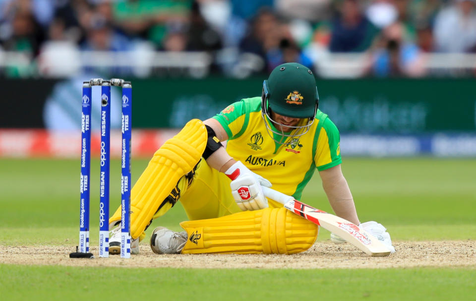 Australia's David Warner goes down after being hit by the ball during the ICC Cricket World Cup group stage match at Trent Bridge, Nottingham. (Photo by Simon Cooper/PA Images via Getty Images)