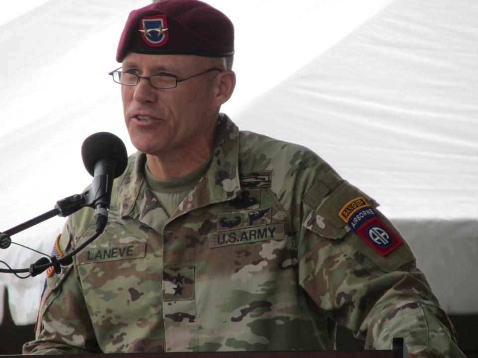 Maj. Gen. Christopher LaNeve, outgoing commander for the 82nd Airborne Division, makes remarks during command change ceremony Friday, Nov. 17, 2023, on Pike Field at Fort Liberty.