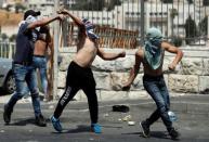 Three dead as clashes erupt over Jerusalem holy site
