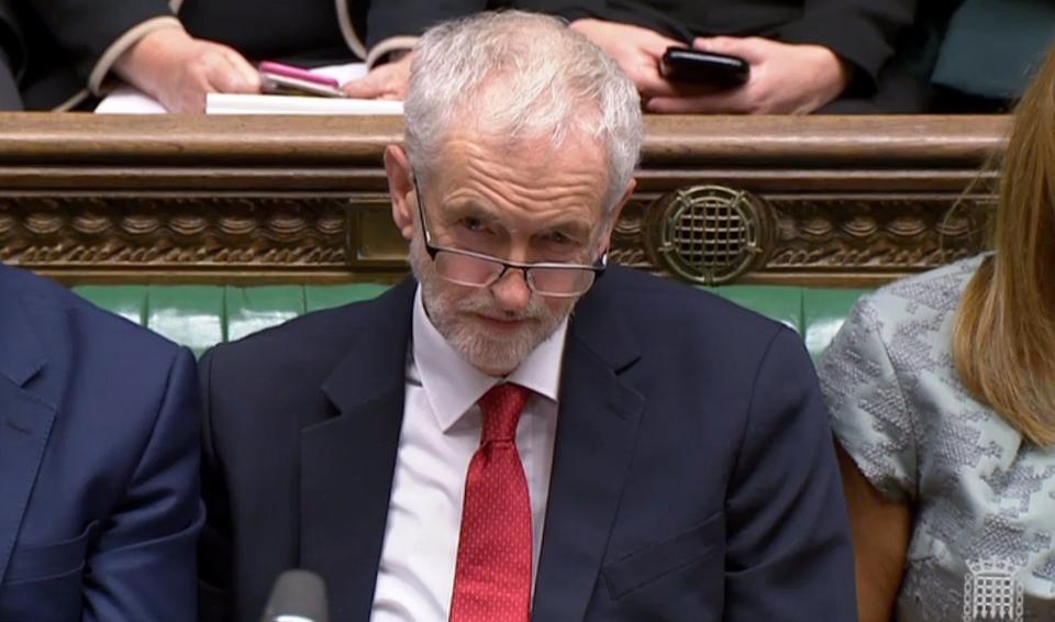 Jeremy Corbyn listens to Theresa May in the Commons on Monday (AFP/Getty Images)