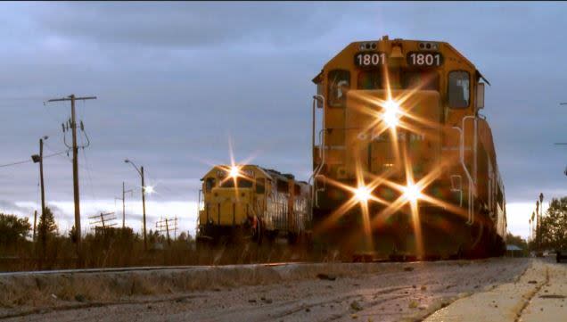 U.S. authorities have charged two men in connection with what they claim is a human smuggling network using freight train cars to sneak people across the border between British Columbia and Washington State. (CBC - image credit)