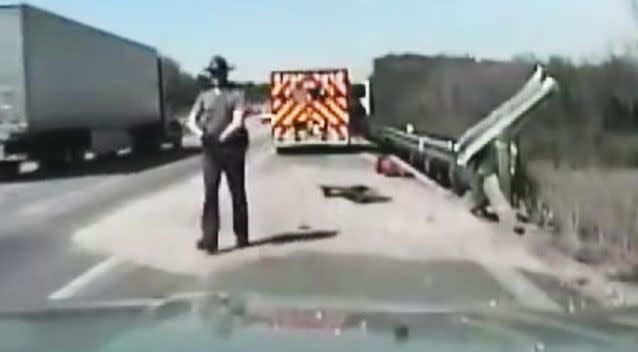 After a job well done, the heroic officer saunters back to his patrol car. Photo: Ohio State Highway Patrol