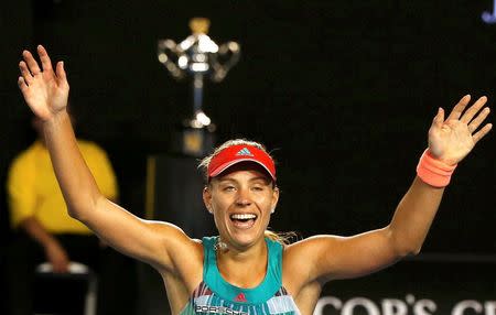 Germany's Angelique Kerber celebrates after winning her final match against Serena Williams of the U.S. at the Australian Open tennis tournament at Melbourne Park, Australia, January 30, 2016. REUTERS/Issei Kato