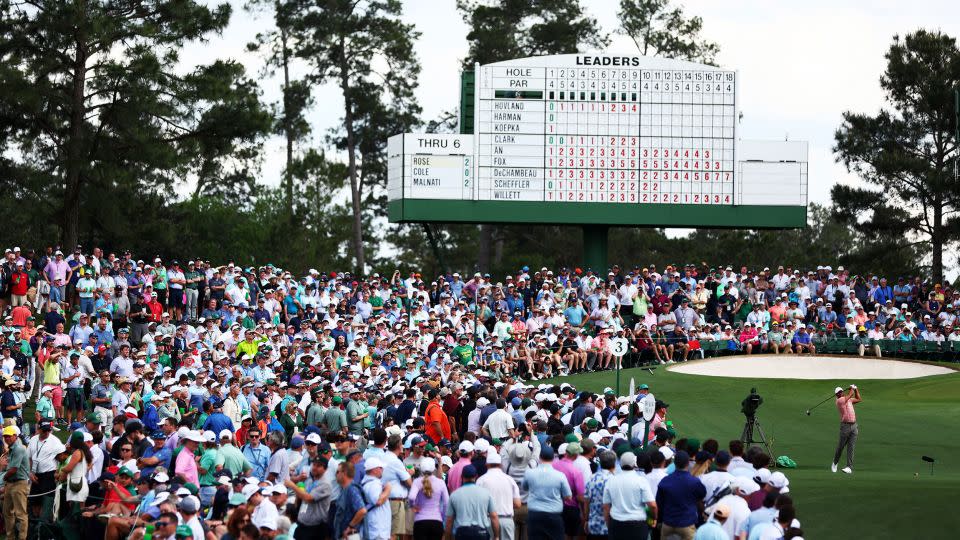 Fans flock to watch Woods tee off from the third tee on Thursday. - Maddie Meyer/Getty Images