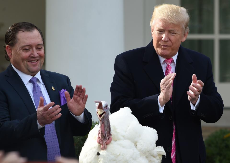 <p>President Donald Trump claps after giving a pardon to the turkey, Drumstick, during the turkey pardoning ceremony at the White House in Washington on Nov. 21, 2017. (Photo: Andrew Caballero-Reynolds/AFP/Getty Images) </p>