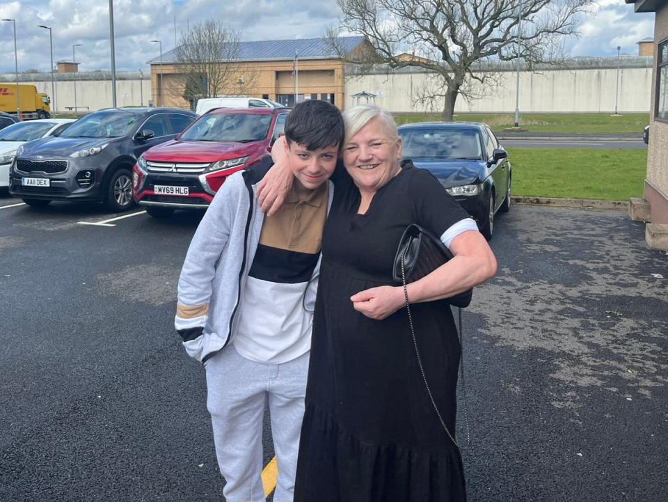 Kayden White with his grandmother Margaret after reuniting with his father Thomas (Margaret White)