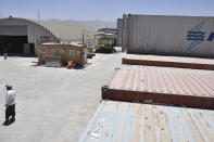 This July 1, 2012, photo released by the U.S. Army Criminal Investigation Command on Feb. 26, 2021, shows a U.S. Army storage yard in Kabul, Afghanistan. Army investigators determined that 65 handguns had been stolen from a cargo container. The theft went undetected until empty pistol boxes were discovered on the compound and a full inventory was taken. (U.S. Army Criminal Investigation Command via AP)