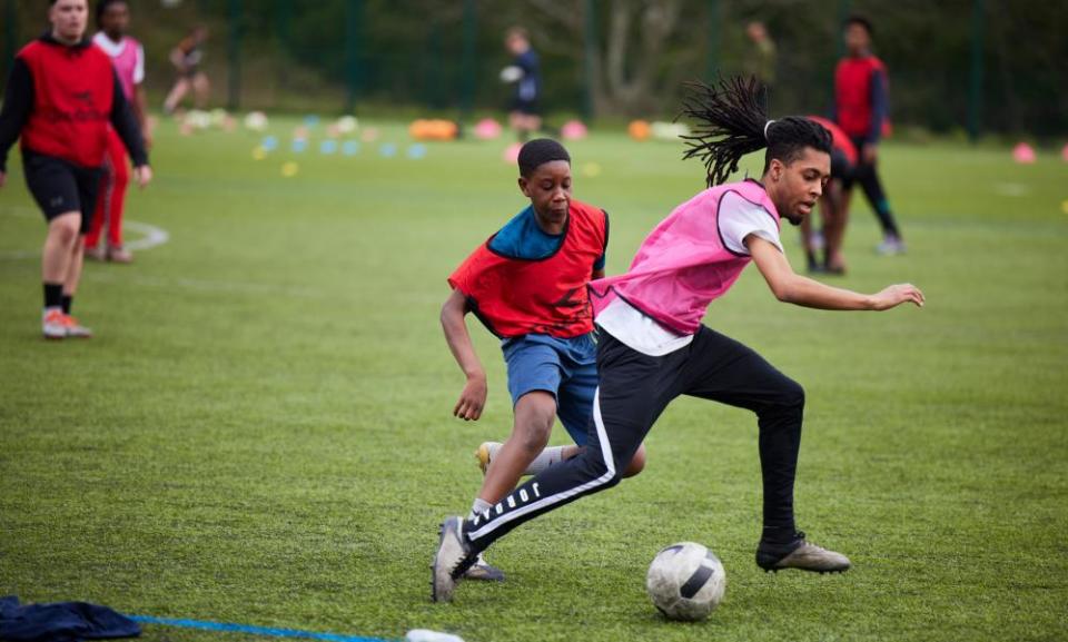 Young footballers at a session in Newton Heath.