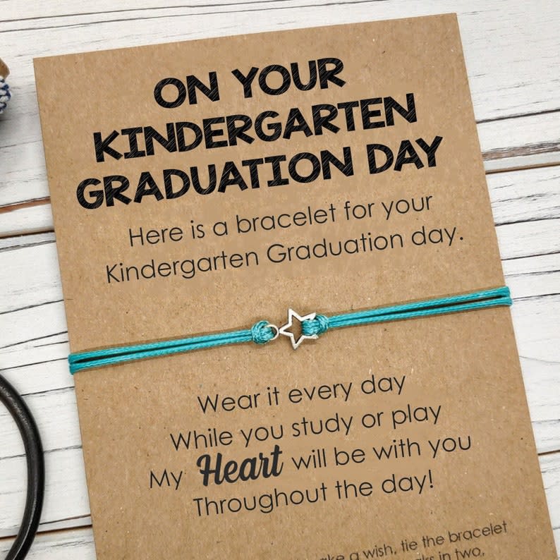 <p><a href="https://go.redirectingat.com?id=74968X1596630&url=https%3A%2F%2Fwww.etsy.com%2Flisting%2F796209037%2Fkindergarten-graduation-gift-graduation&sref=https%3A%2F%2Fwww.thepioneerwoman.com%2Fholidays-celebrations%2Fgifts%2Fg43478530%2Fkindergarten-graduation-gifts%2F" rel="nofollow noopener" target="_blank" data-ylk="slk:Shop Now;elm:context_link;itc:0;sec:content-canvas" class="link rapid-noclick-resp">Shop Now</a></p><p>Kindergarten Graduation Gift Graduation Bracelet</p><p>etsy.com</p><p>$8.00</p><span class="copyright">Etsy</span>