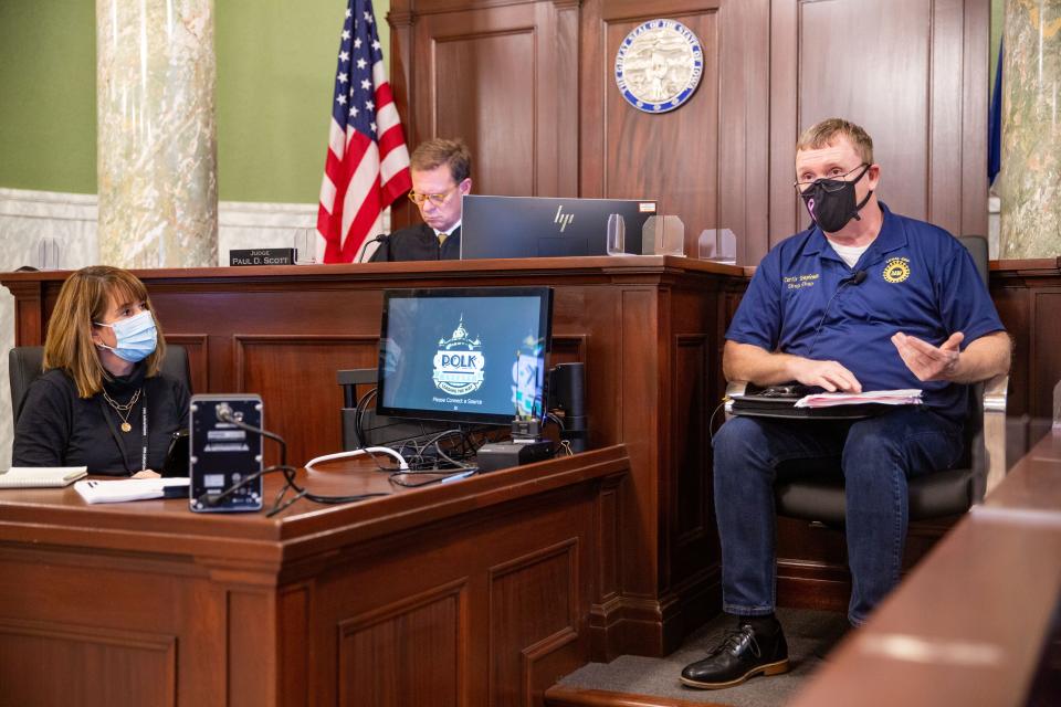 UAW Local 450 bargaining committee chair Curtis Templeman testifies in a hearing at the Polk County Courthouse Oct. 21 on a Deere & Co. request for an injunction against UAW workers picketing in Ankeny .