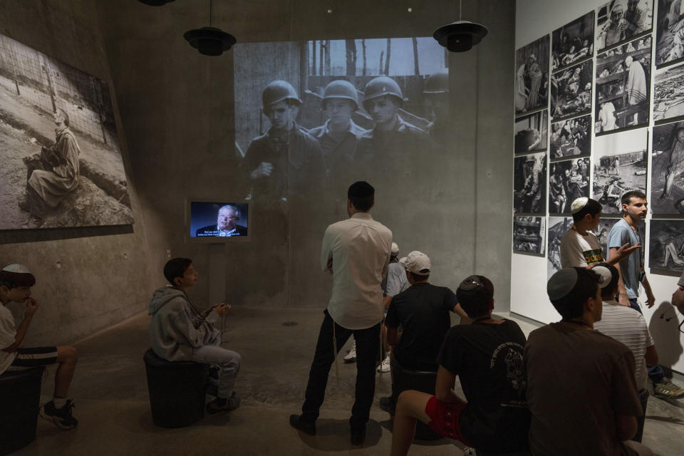 People visit the Yad Vashem Holocaust Memorial Museum in Jerusalem, Sunday, May 5, 2024. The annual Israeli memorial day for the 6 million Jews killed in the Holocaust of World War II begins at sundown Sunday. (AP Photo/Ohad Zwigenberg)