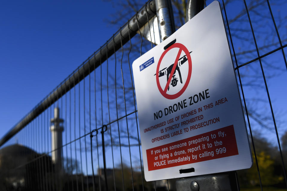 A No Drone Zone sign is posted on a fence which has been set up around Winfield House, the US Ambassador's residence as US President Donald Trump is set to arrive ahead of the NATO Summit in London, Monday, Dec. 2, 2019. U.S. President Donald Trump will gather with NATO’s other leaders in London Tuesday as the world’s biggest military alliance, marking its 70th birthday, battles with one of the most confounding of adversaries: Itself. (AP Photo/Alberto Pezzali)