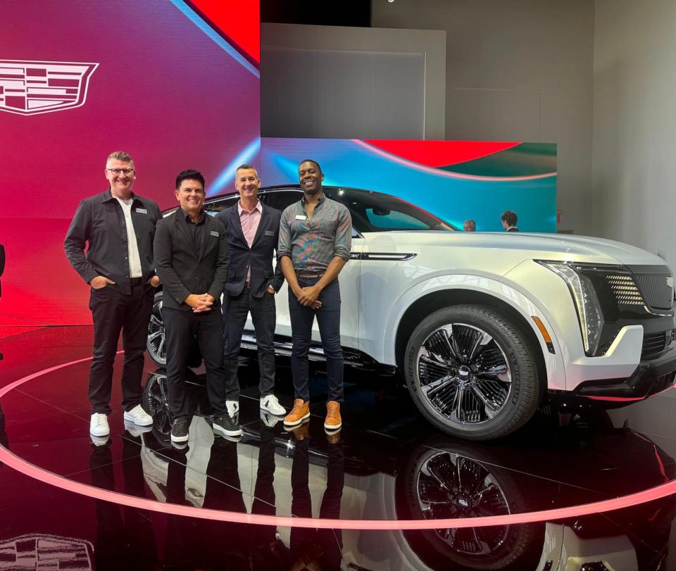 PHOTO: Designer Brandon Lynum worked extensively on the all-electric Cadillac IQ. Also pictured: Craig Sass, design manager of Cadillac interiors; Bryan Nesbitt, executive director of Global Cadillac; and Timothy Kozub, design director at Cadillac. (General Motors)