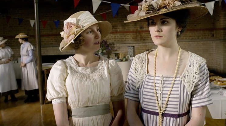 Laura Carmichael as Lady Edith Crawley and Michelle Dockery as Lady Mary Crawley in PBS's Downton Abbey. (Photo Credit: MASTERPIECE/PBS)