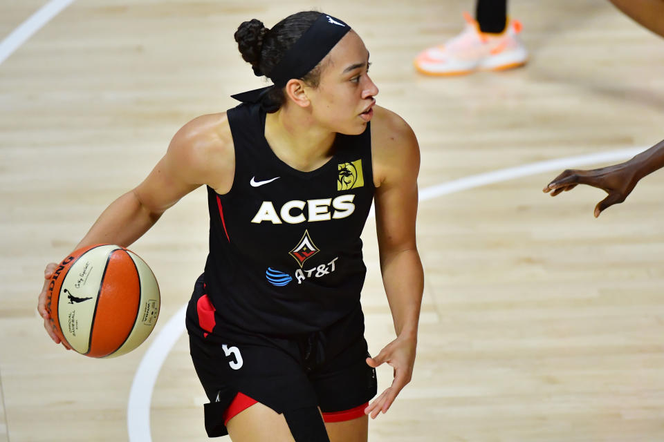 PALMETTO, FLORIDA - SEPTEMBER 22: Dearica Hamby #5 of the Las Vegas Aces dribbles during the first half of Game 2 of their Third Round playoffs against the Connecticut Sun at Feld Entertainment Center on September 22, 2020 in Palmetto, Florida. NOTE TO USER: User expressly acknowledges and agrees that, by downloading and or using this photograph, User is consenting to the terms and conditions of the Getty Images License Agreement. (Photo by Julio Aguilar/Getty Images)