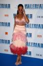 <p>Rihanna opted for a fun Prada number full of beading and feathers. She teamed the pink ensemble with fluffy heels from Charlotte Olympia and matching sunglasses. (Photo: Getty Images) </p>