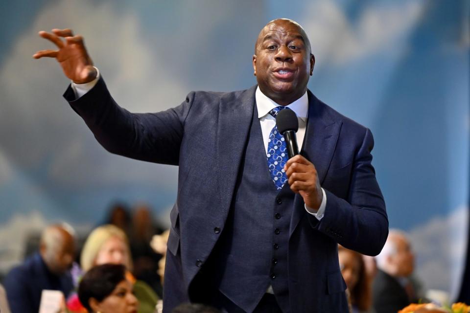 <p><a href="https://people.com/tag/magic-johnson/" rel="nofollow noopener" target="_blank" data-ylk="slk:Magic Johnson;elm:context_link;itc:0" class="link ">Magic Johnson</a> speaks during the 2023 International Poverty Forum at the Delta Flight Museum on March 17 in Atlanta.</p>