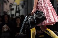 <p>We’d all forgetten about Prada’s iconic nylon bags. Luckily, Miuccia was on hand to refresh our memories and bring back the staple for SS18.<br><em>[Photo: Prada]</em> </p>