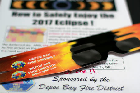 FILE PHOTO - Solar eclipse glasses that will be handed out by the community are pictured in Depoe Bay, Oregon, U.S. on August 8, 2017. REUTERS/Jane Ross