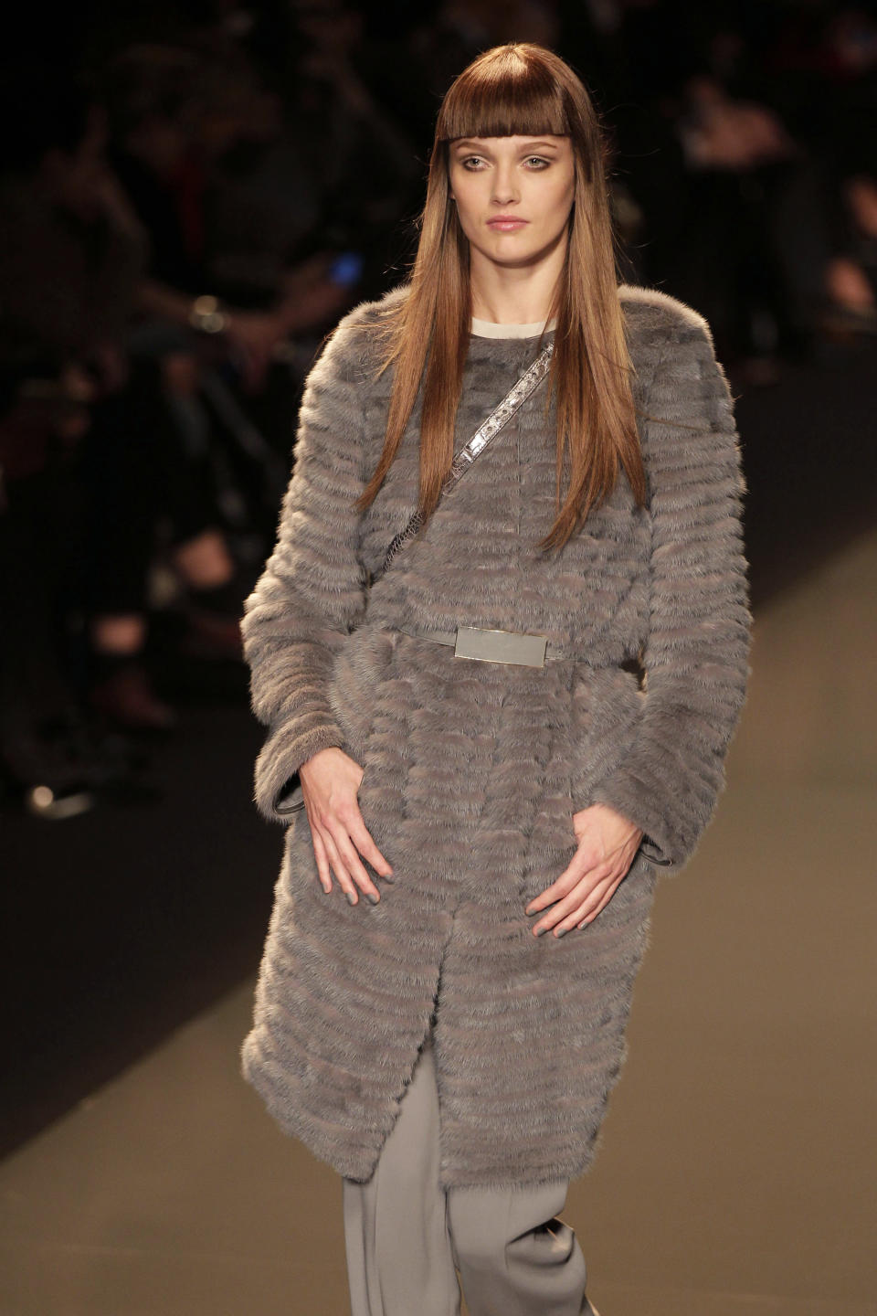 A model presents a creation by Lebanese designer Elie Saab as part of his Women's Fall-Winter, ready-to-wear 2013 fashion collection, during the Paris Fashion week, Wednesday, March 7, 2012. (AP Photo/Michel Euler)