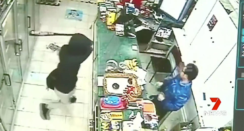 <span>Incredible CCTV footage shows how a shop attendant fought back against a man armed with a baseball bat</span> at a Melbourne milk bar. Source: 7 News