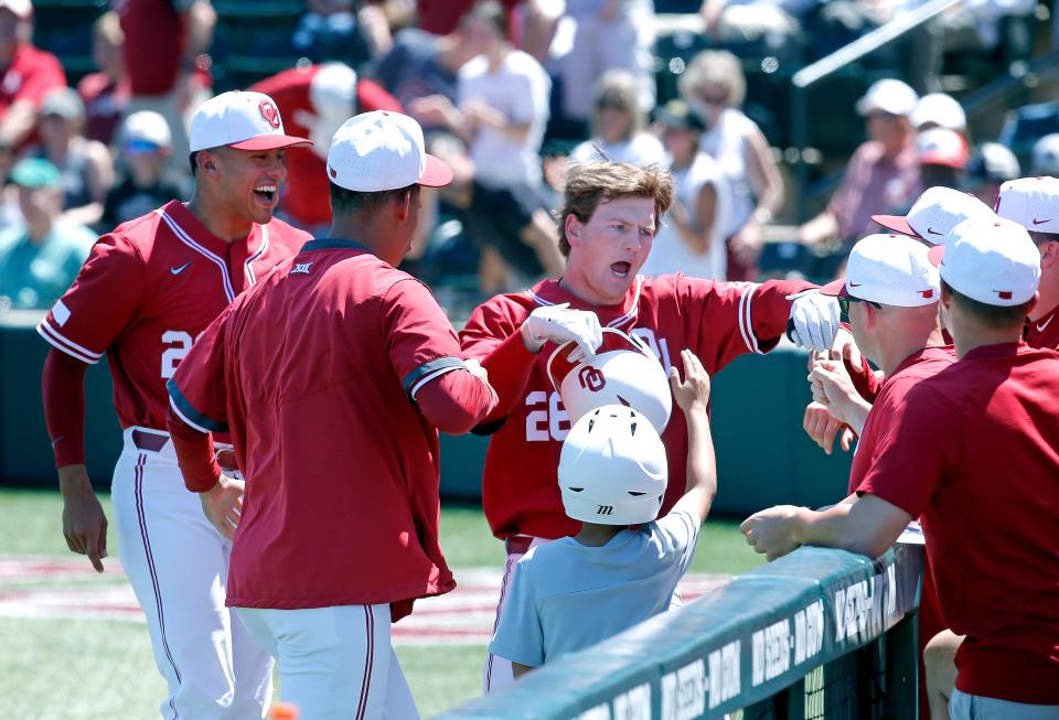 Oklahoma's Blake Robertson (26) celebrates a home run in the second inning during the Big 12 baseball game between the University of Oklahoma Sooners (OU) and the Kansas State Wildcats in Norman, Okla., Saturday, April, 30, 2022. 