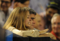 Kim Sears, girlfriend of Andy Murray of Britain gestures during his semi-final men's singles match against Novak Djokovic of Serbia on the twelfth day of the Australian Open tennis tournament in Melbourne early January 28, 2012. Djokovic won 6-3. 3-6. 6-7. 6-1. 7-5. . IMAGE STRICTLY RESTRICTED TO EDITORIAL USE STRICTLY NO COMMERCIAL USE (Photo by Greg Wood/AFP/Getty Images)