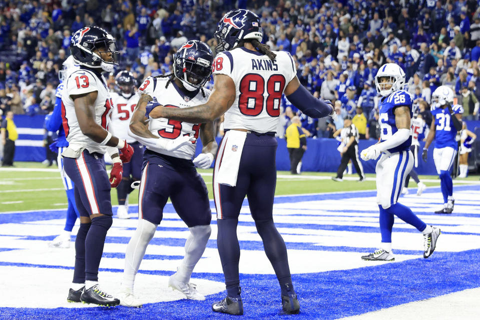 INDIANAPOLIS, INDIANA - JANUARY 08: Jordan Akins #88 of the Houston Texans celebrates a two point conversion during the fourth quarter of the game against the Indianapolis Colts at Lucas Oil Stadium on January 08, 2023 in Indianapolis, Indiana. (Photo by Justin Casterline/Getty Images)