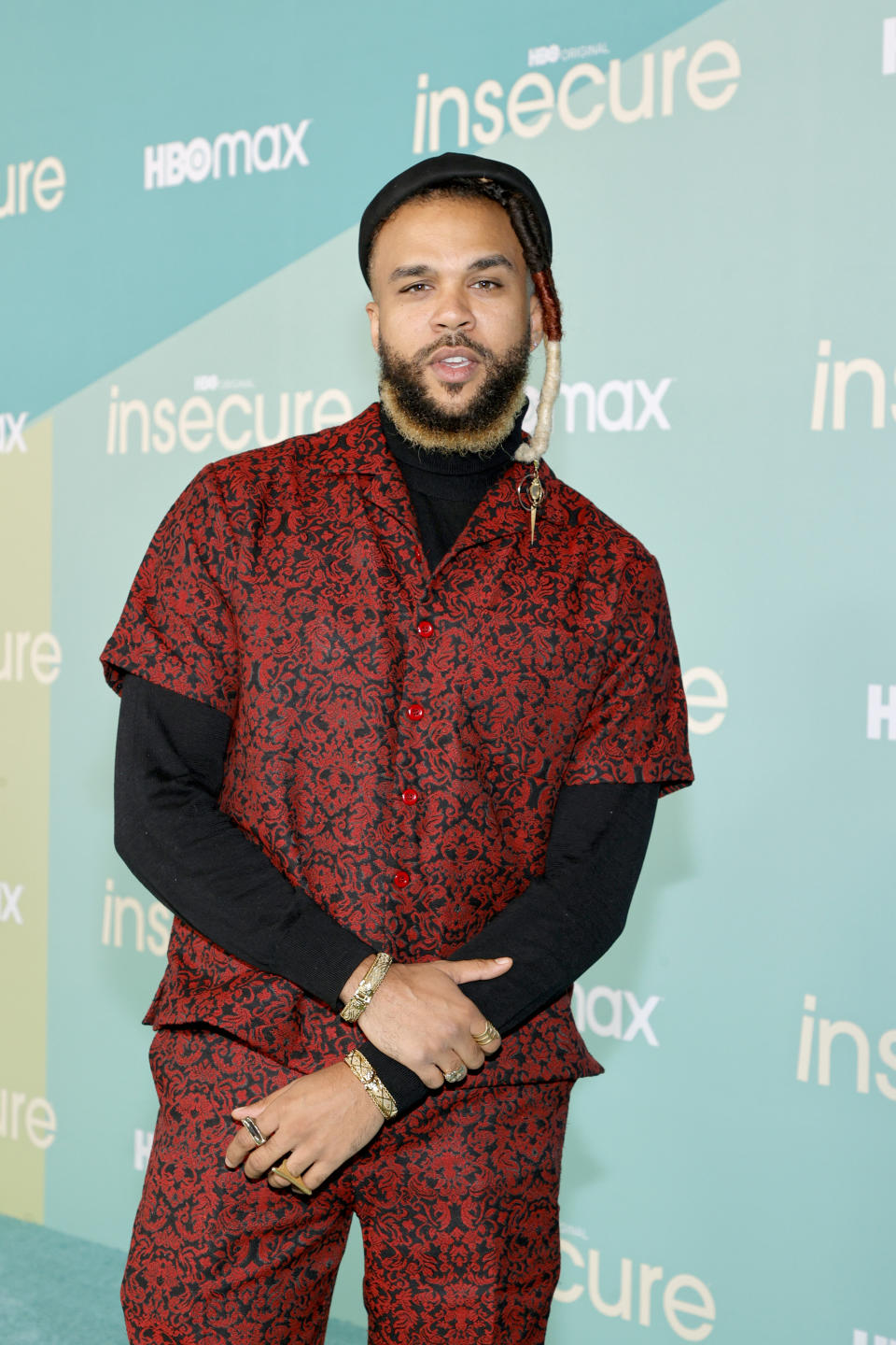 Jidenna wearing red