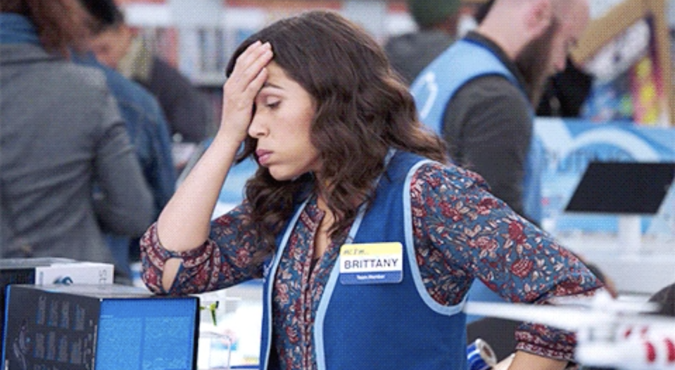 A stressed retail worker from Superstore