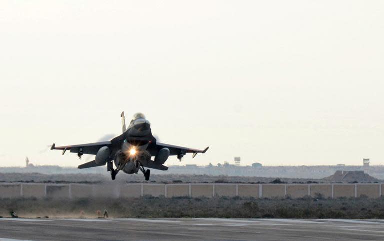 An Egyptian air force fighter jet is pictured landing at an undisclosed location in Egypt after air strikes against jihadist targets in Libya in this photo from Cairo's Ministry of Defence