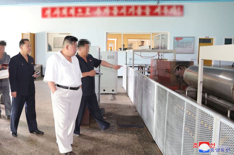 North Korean leader Kim Jong Un inspects the Pukjung Machine Complex and a major munitions factory