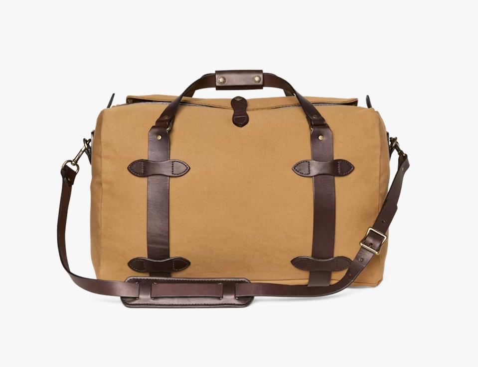 <p><a href="https://go.redirectingat.com?id=74968X1596630&url=https%3A%2F%2Fwww.filson.com%2Fbags-luggage%2Fduffle-bags%2Fmedium-rugged-twill-duffle-bag.html&sref=https%3A%2F%2F" rel="nofollow noopener" target="_blank" data-ylk="slk:Shop Now;elm:context_link;itc:0;sec:content-canvas" class="link ">Shop Now</a></p><p>Medium Rugged Twill Duffle Bag</p><p>filson.com</p><p>$595.00</p>