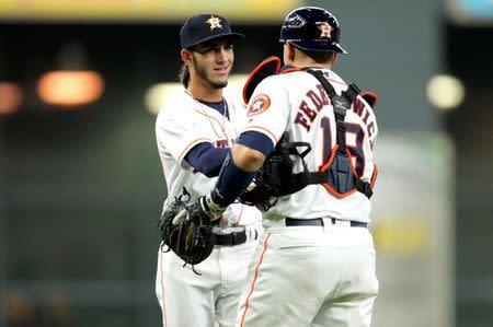 Jul 14, 2018; Houston, TX, USA; Houston Astros relief pitcher Cionel Perez (59) celebrate after the final out of Houston's 9-1 win over the Detroit Tigers during the ninth inning at Minute Maid Park. Mandatory Credit: Erik Williams-USA TODAY Sports