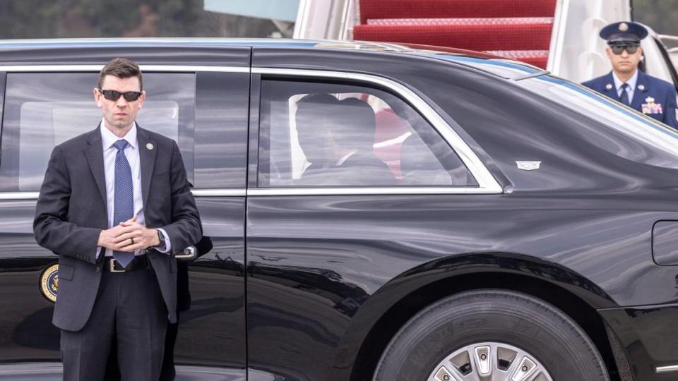 Gov. Roy Cooper sits in the Presidential limo with President Joe Biden at RDU International Airport Tuesday, March 28, 2023. Biden went on Wolfspeed in Durham Tuesday where he launched his Investing in America Tour.